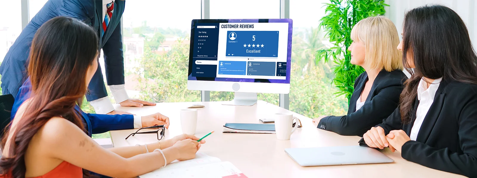 Managed IT team reviewing service performance and client feedback with a not-for-profit organisation.