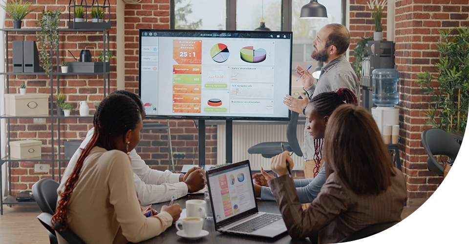 Business meeting with dashboard presentation and team discussion