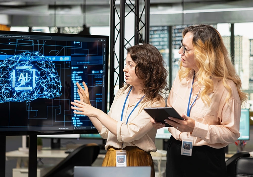 Managed IT professional demonstrating AI-powered technology solutions for a not-for-profit organisation.